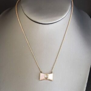 Kate Spade Bow Shoppe Rose Gold Mother of Pearl Crystal Bow Pendant Necklace